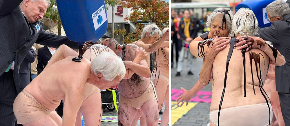 Elderly rebels in just underwear embrace as they are covered in fake oil