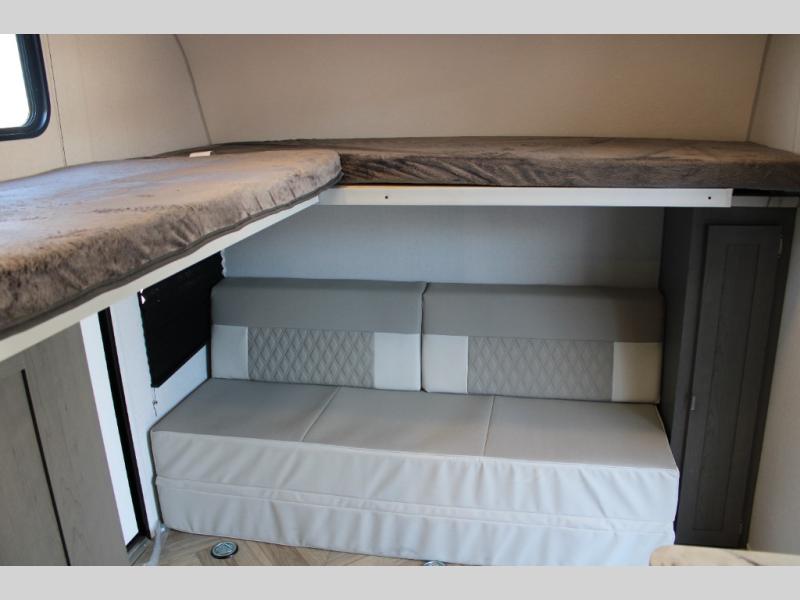 The Versa bed features bunks overhead, so there’s space for the kids.