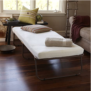 Compact guest bed with storage bag