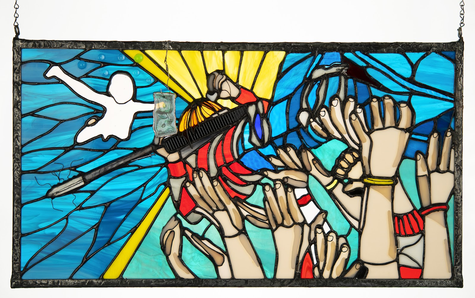 Andrew D Gore’s Nirvana-inspired stained glass art. This piece showcases the swimming baby from their ‘Nevermind’ album and a guitar playing Kurt Cobain crowd surfing.