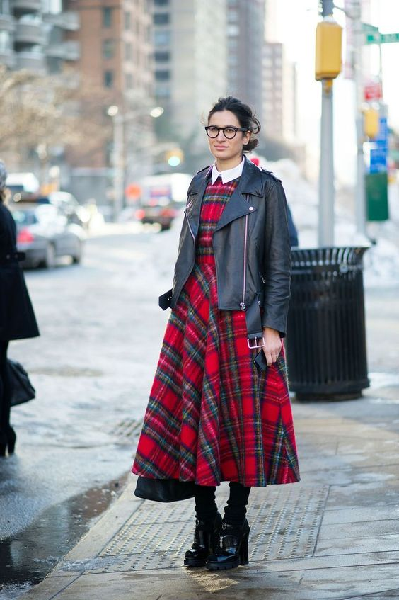 Picture showing the gorgeous Elena Moussa rocking a dress and a coat