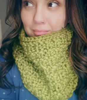 Hand-knitted cowl made with acrylic/wool blend yarn.  Warm and cozy accessory that will add a pop of color to any outfit.  Crafted by Cindy Borges-Suarez, CLP Mentor.  Product care: Hand wash, lay flat to dry.  Starting bid - $25