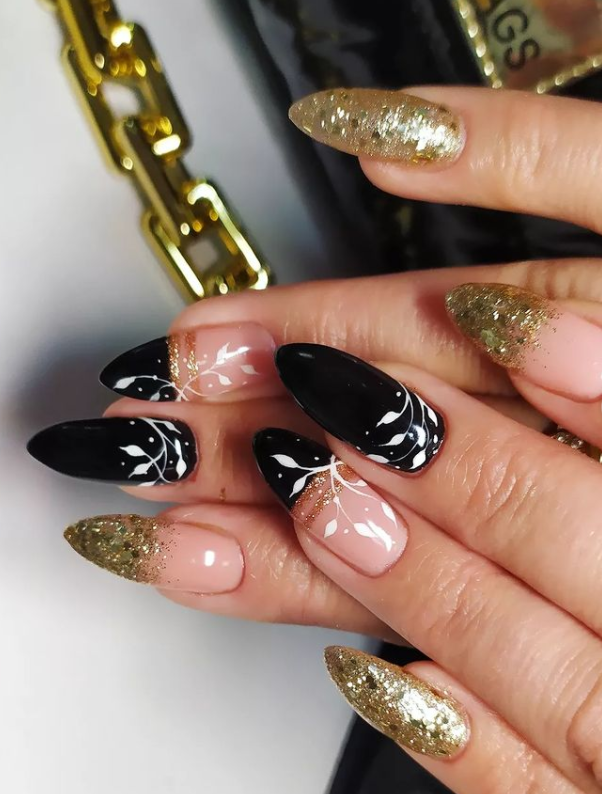 Artsy leaves black gold nail design ideas