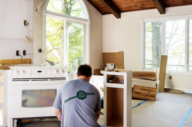 custom built carpenter team member working on kitchen remodel