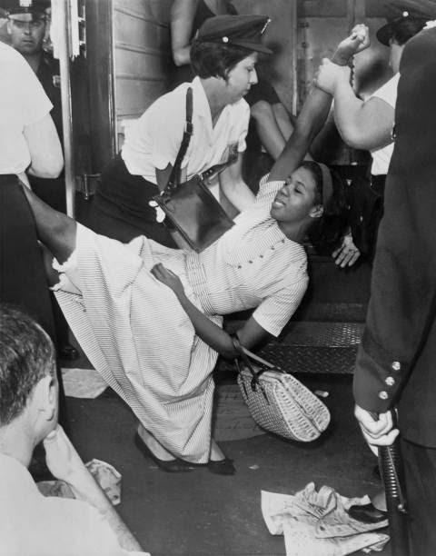 African American Woman Being Carried to Police Patrol Wagon During Demonstration, Brooklyn, New York, USA, Dick DeMarsico, World Telegram & Sun, 1963.