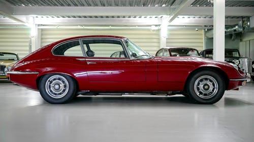 Black Red Classic Car in a Garage