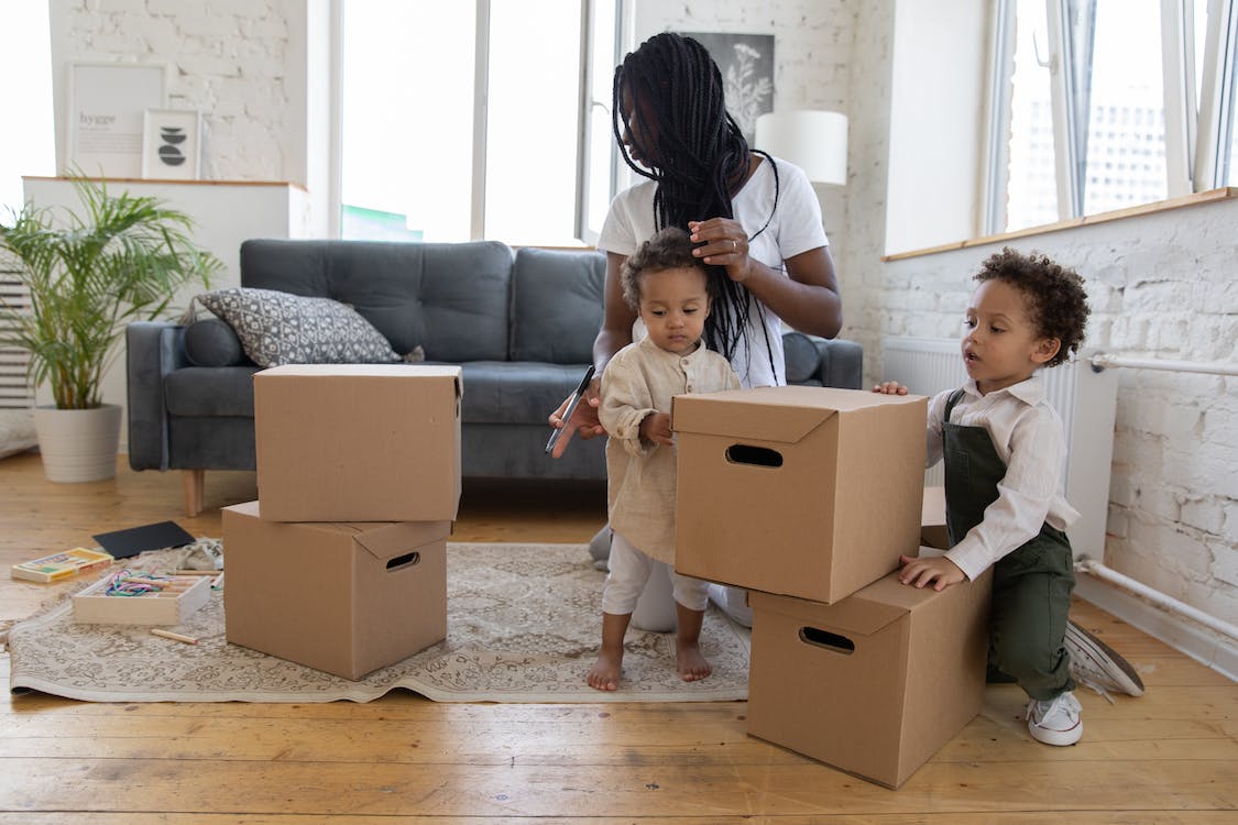 Free Family Packing Boxes Stock Photo