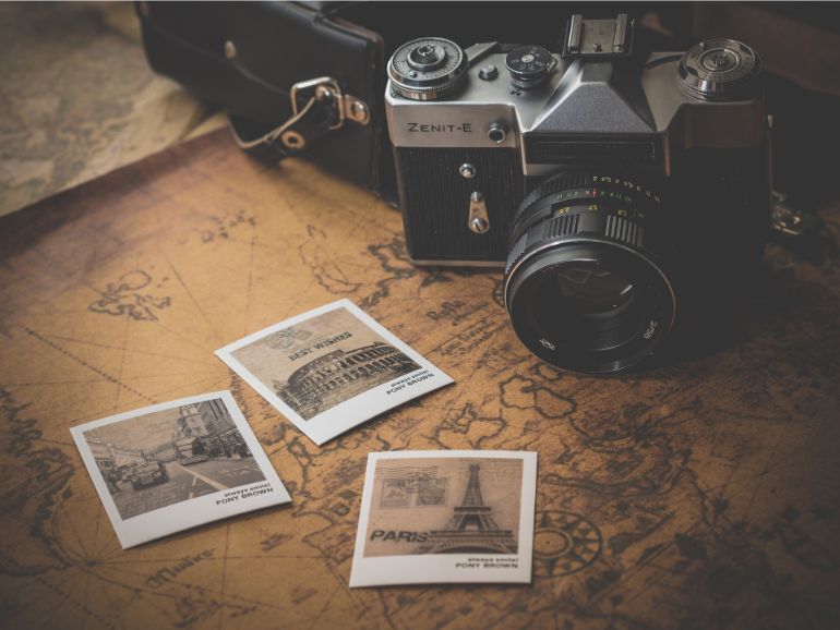 Fotos em cima de uma mapa - ser un fotógrafo profesional