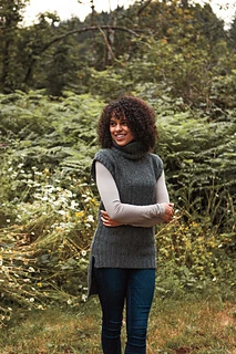 woman wearing a sleeveless crochet tunic