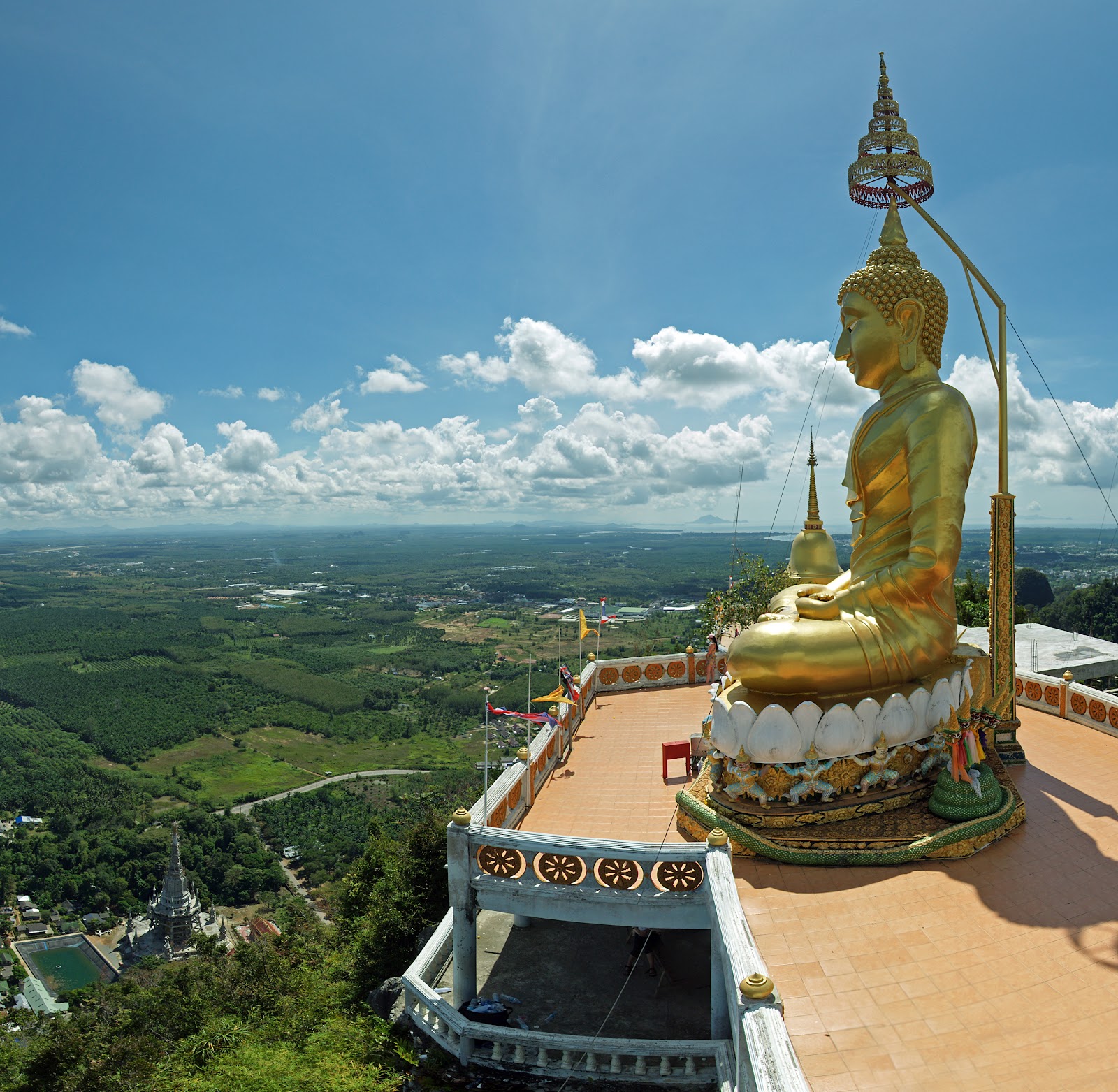 The large, golden Buddha statue of Tiger Cave Krabi.