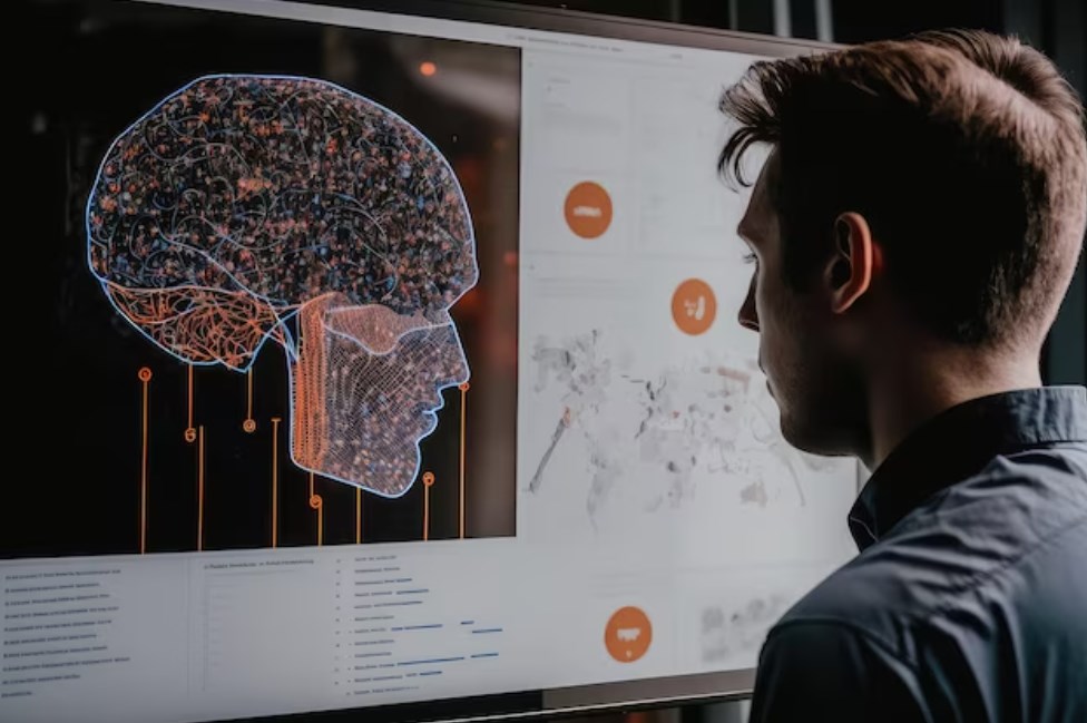 a young man learning how to use machine-learning platform by exploring sample data