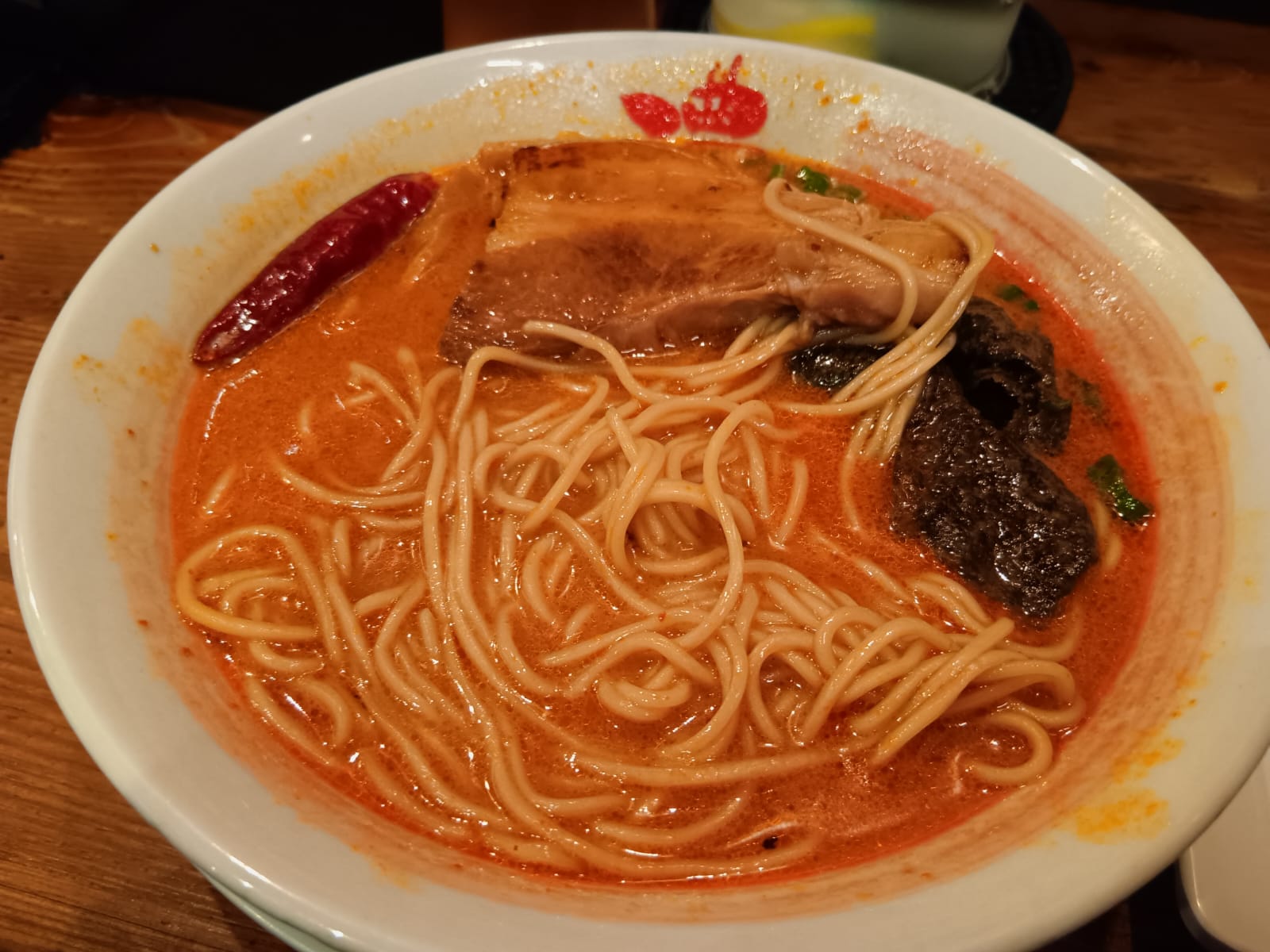 Ramen Bari-Uma spicy tonkotsu ramen noodles with char siu slab and nori sheets