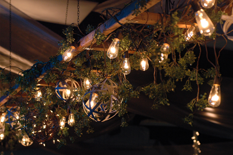 ladder wrapped with vines and branches