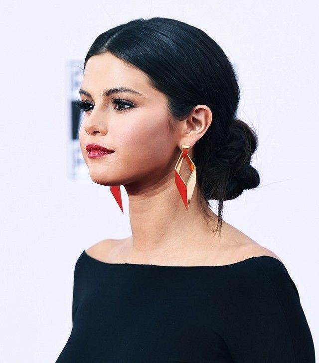 Image result for selena gomez twisted low bun
