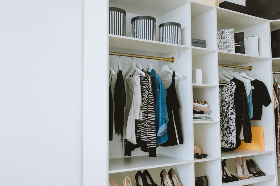 Photo of a closet with clothes and shoes