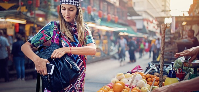 Young woman at market stall