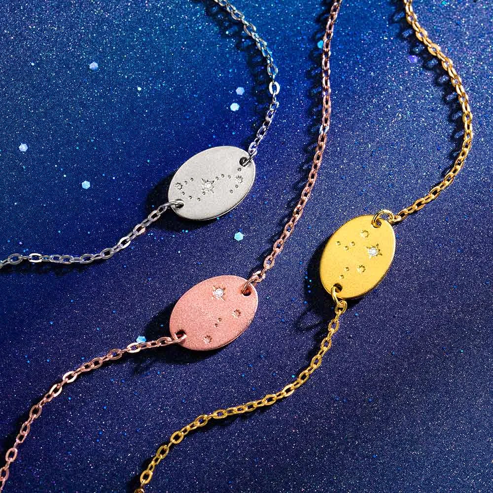 3 bracelets en platine, or et or rose, présentant la constellation du zodiaque.