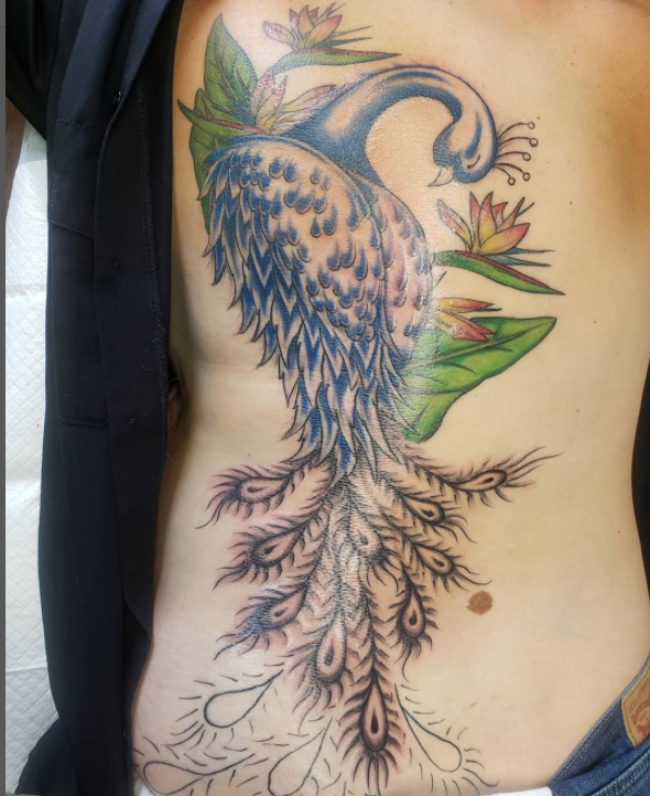 Lovely Peacock Tattoo Design