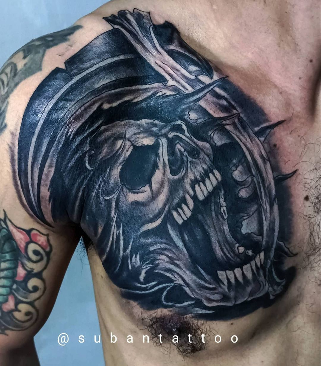 Angel Of Death Tattoo On Chest