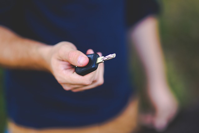 hand the car key to the teenager to drive - things to do on a car trip with a teenager