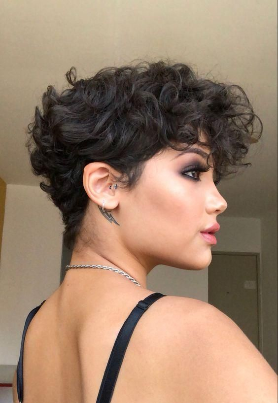 lady wearing curly pixie cut 