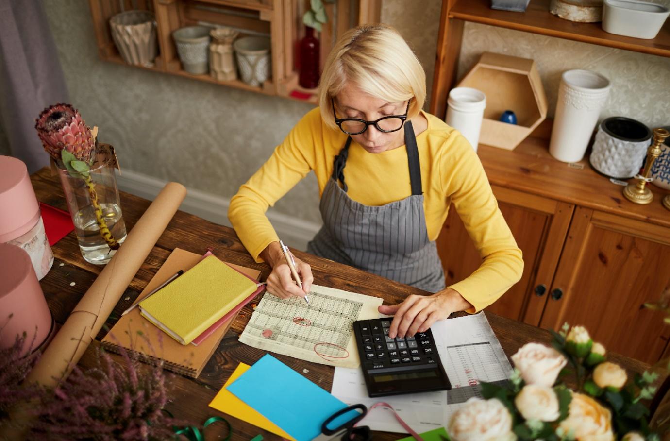 Female entrepreneur working in her home