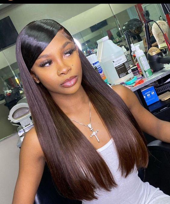 Beautiful lady on lashes shows off her straight quick weave