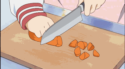 Cuchillo cortando zanahoria