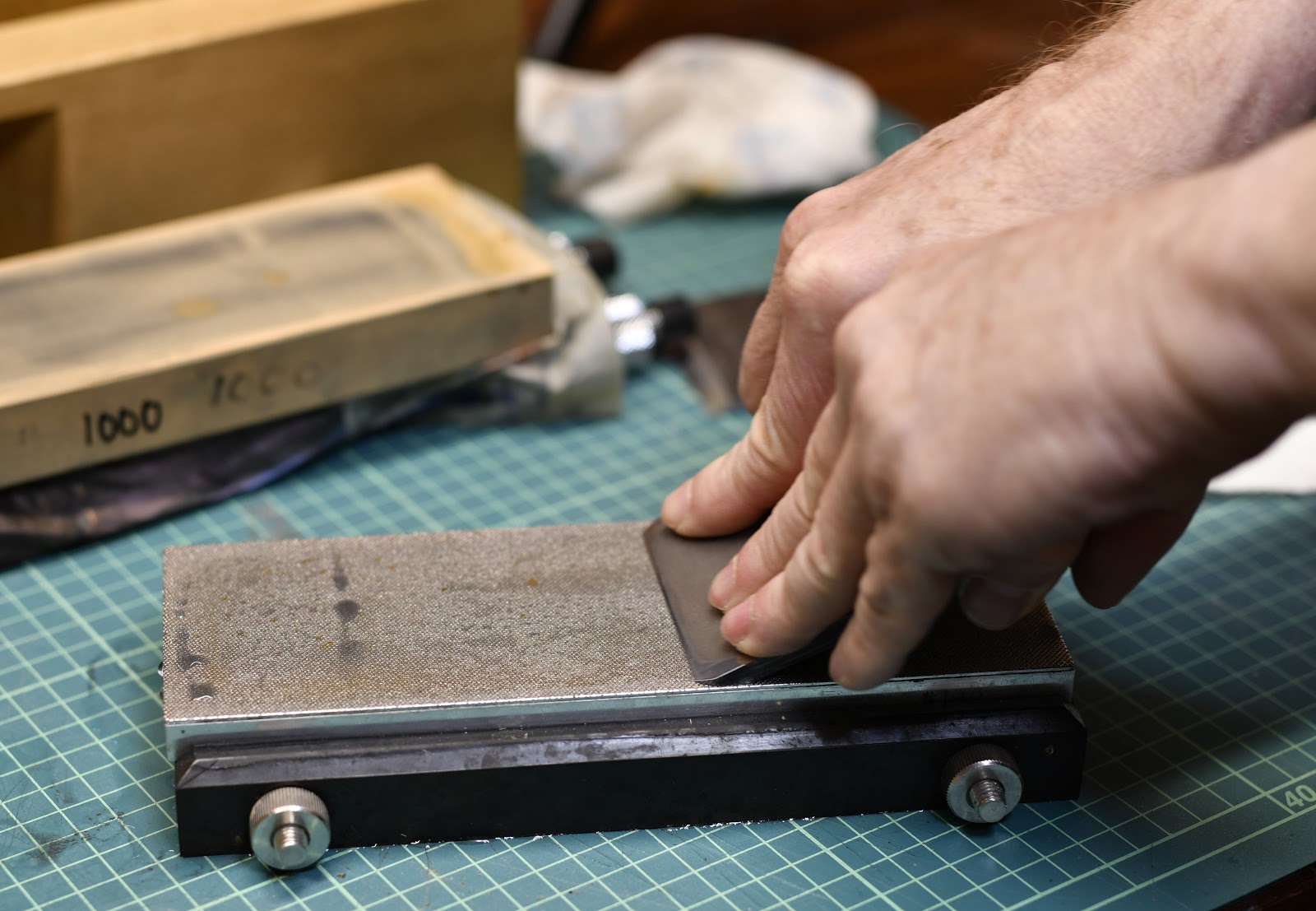 This is the Musashi Whet Stone Sharpening Kit Mounted 1,000 Grit. The  polishing stone comes in 1,000 grit. The stone is mounted in a wood casing.  Instructions for sharpening the knife has