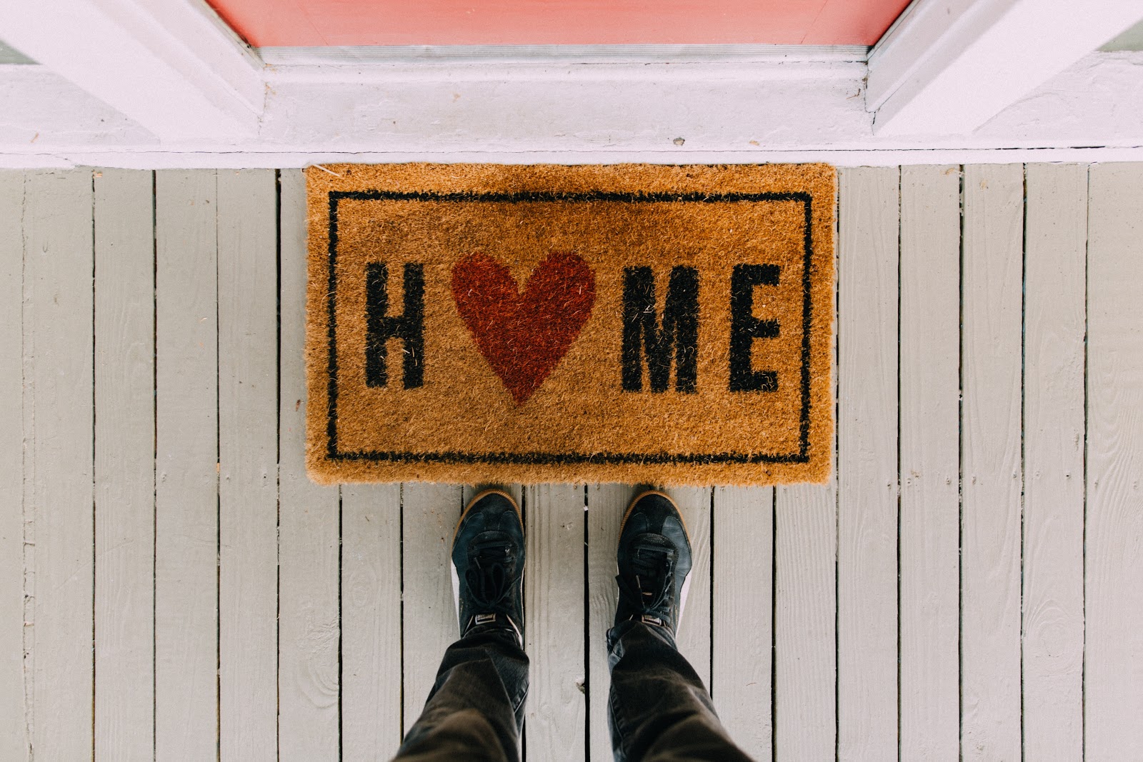 door mat with the word home on, things to save and splurge within your home