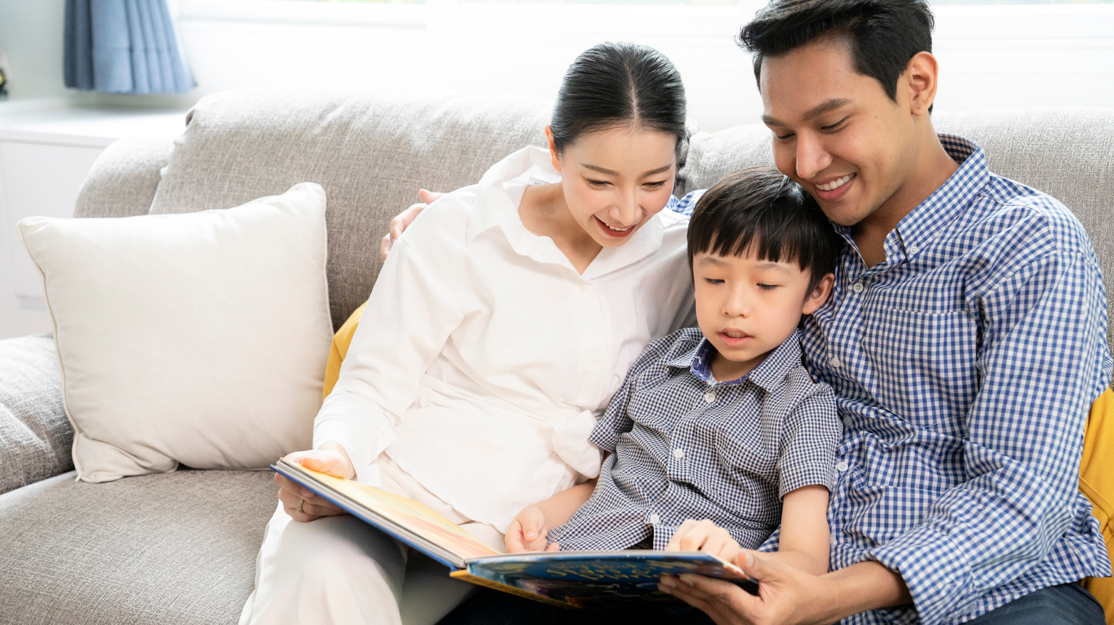 Parents reading aloud together