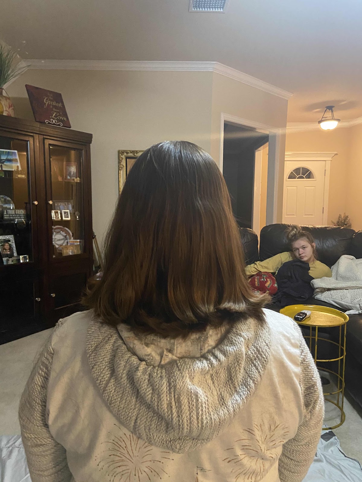 daughter cuts my hair back
