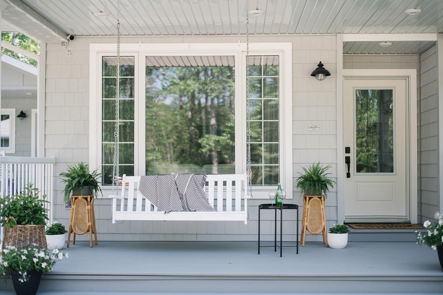 WeServe Front House Patio With White Swing