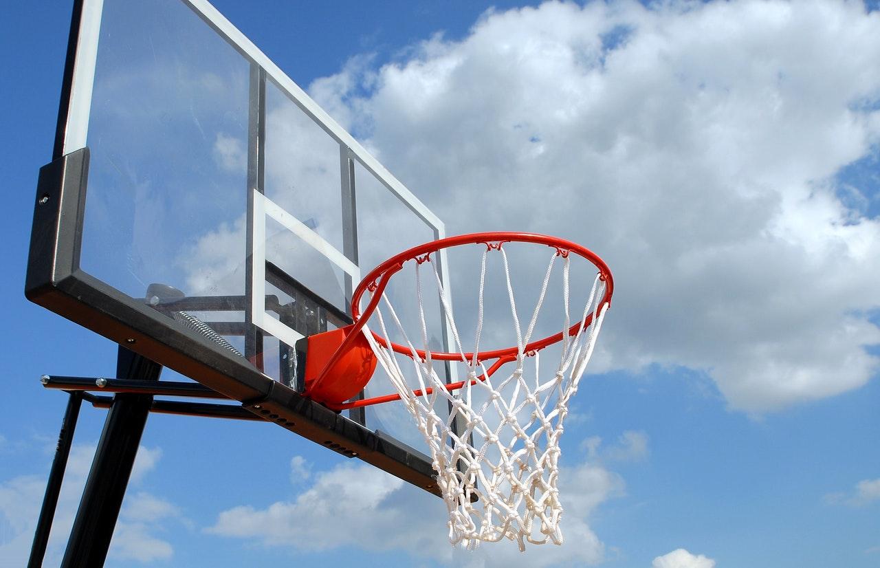 A picture containing athletic game, sport, sky, basketball

Description automatically generated