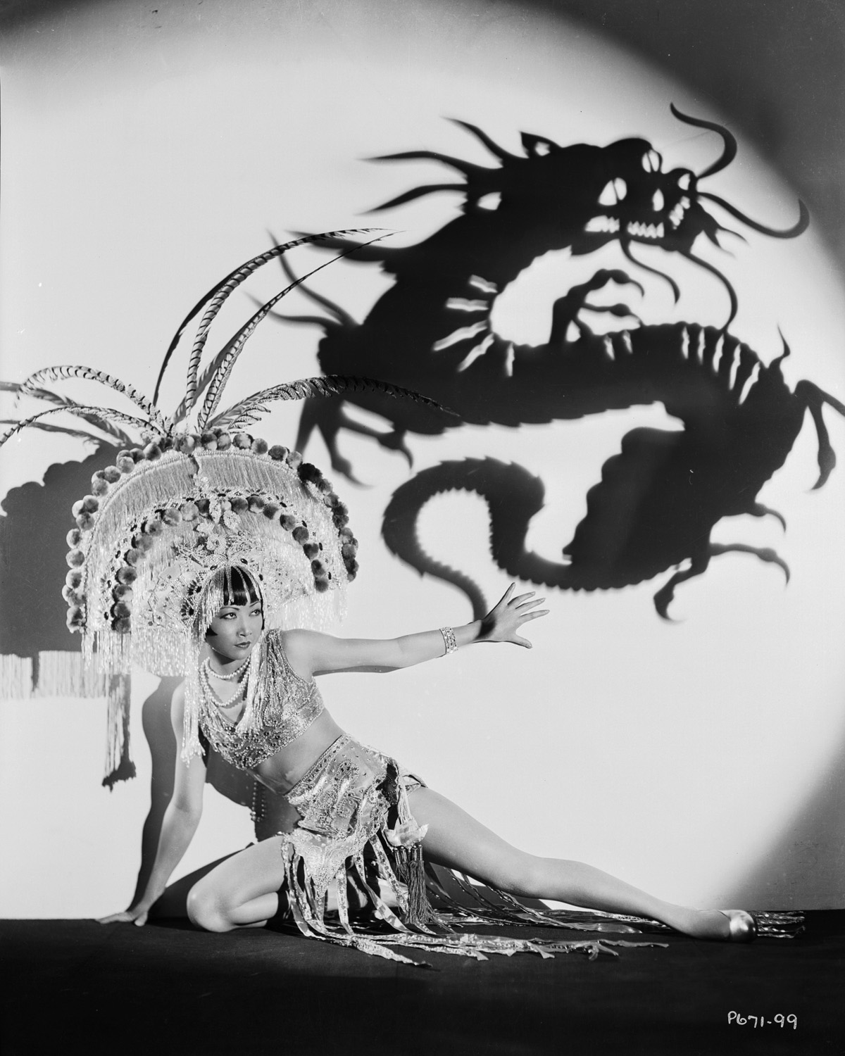 Anna May Wong in an exotic costume and headdress (sixthtone.com)