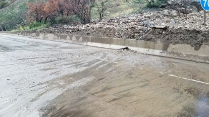 Muddy water covers the roadway