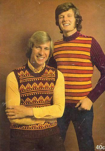 Two men in colorful sweaters. 