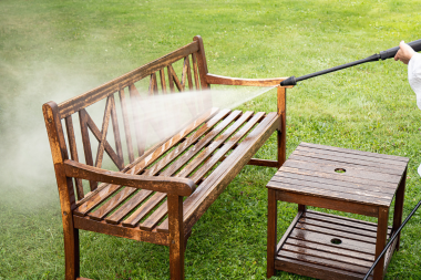 power washing outdoor furniture to prepare for fall in Michigan