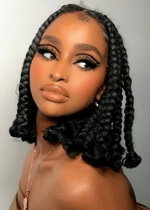 a lady rocking short box braids