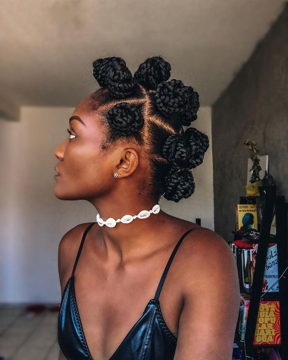 a lady wearing bantu knot short hairstyles for women