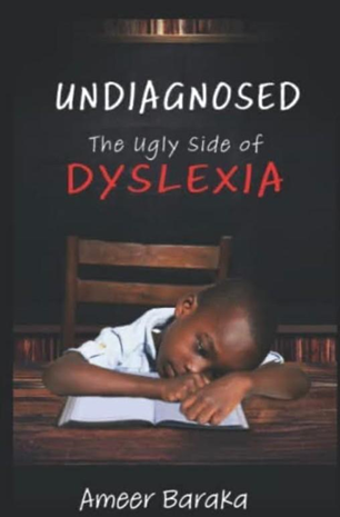 Book Cover: Undiagnosed: The Ugly Side of Dyslexia by Ameer Baraka - small black boy napping at a desk