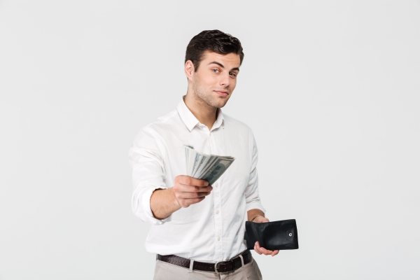a-man-holding-money-pay