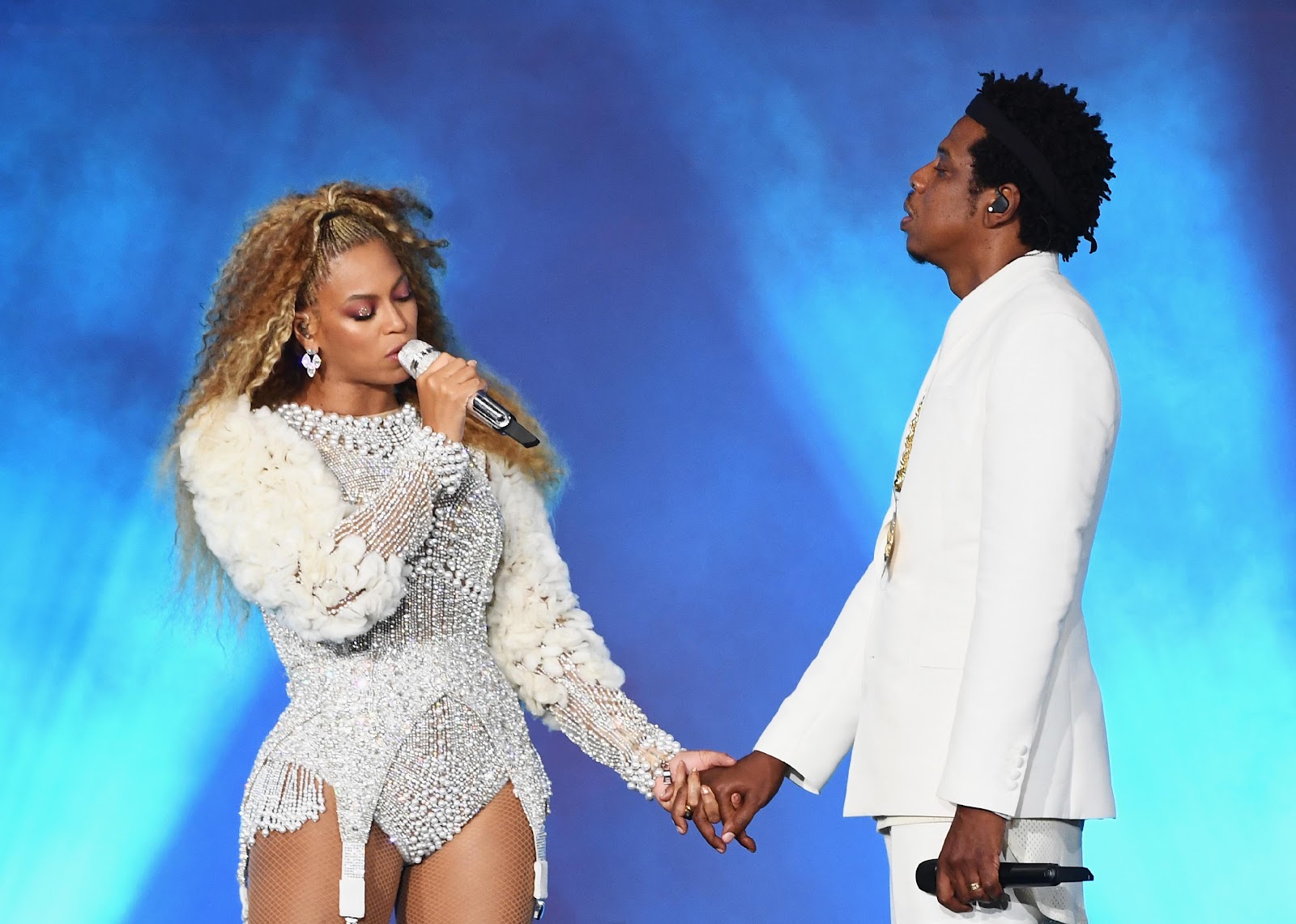 Beyonce and Jay-Z perform onstage during the "On The Run II" Tour.