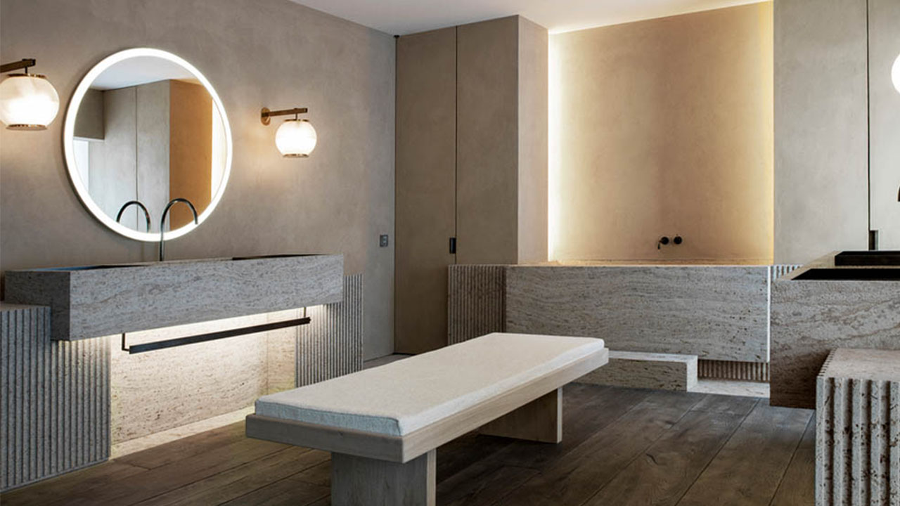 Phòng tắm lát gạch trắng kết hợp tủ gỗ tạo điểm nhấn cho không gian