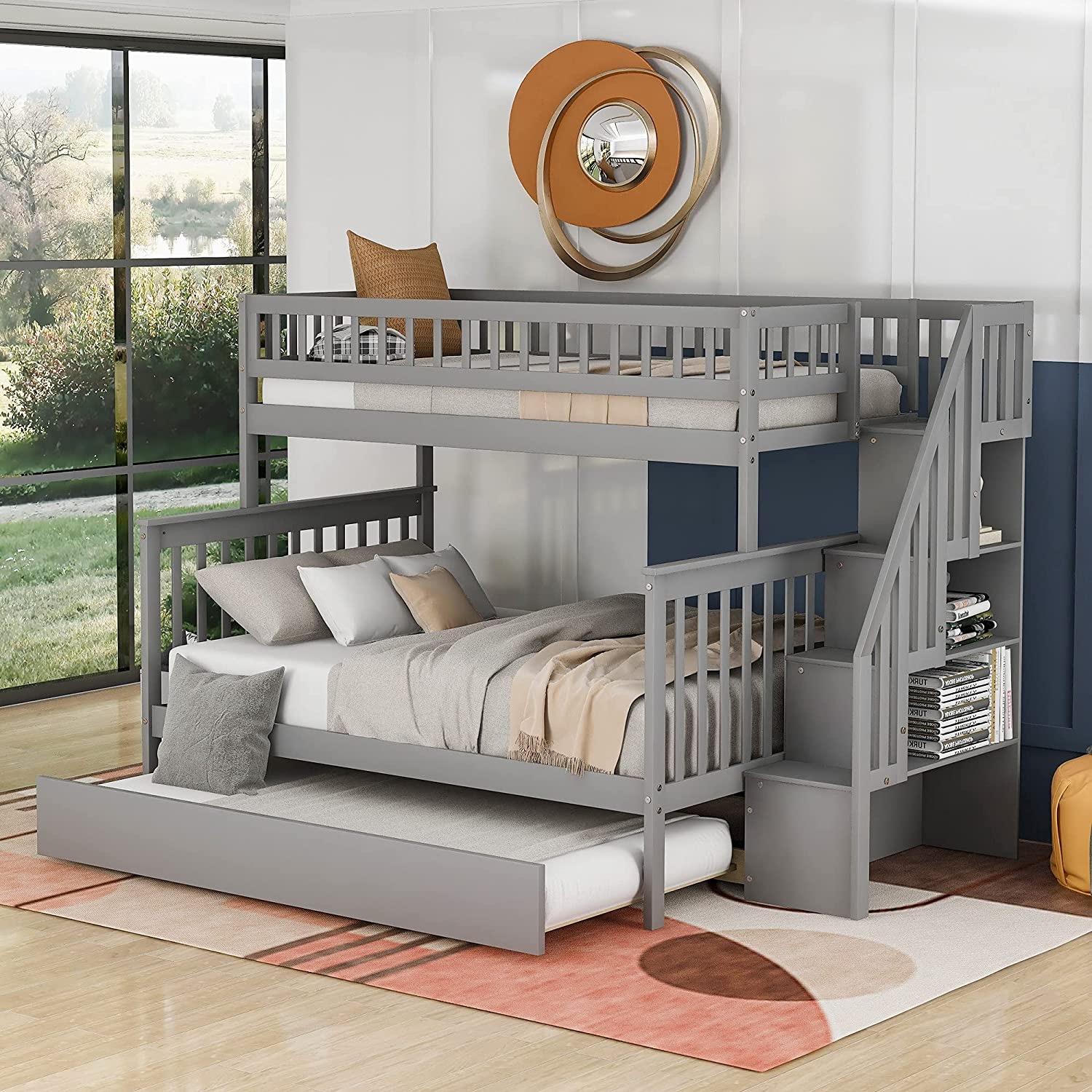 This bunk bed and trundle bed unit provides sleeping space for three children while taking up the floor space of one bed.