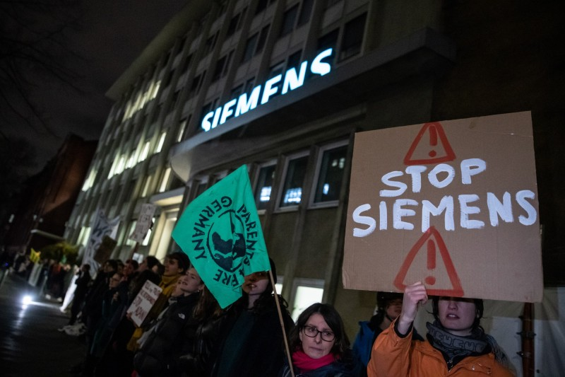 "Stop Siemens" Sign, 1.5 C summit, Echo Asia Communications