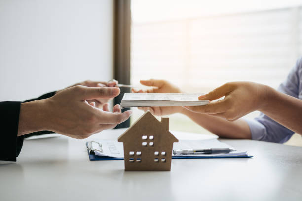 a tenant paying for a perfect apartment she just rented.