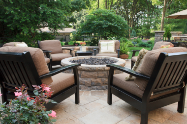 cozy nook with fire pit for fall outdoor living space in Michigan