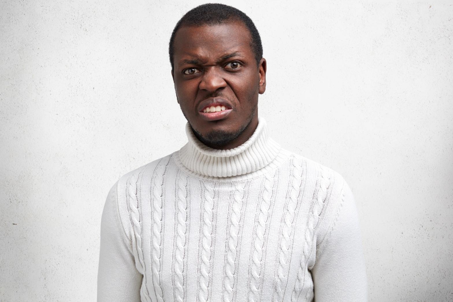 portrait-displeased-handsome-young-african-american-male-has-disgusting-expression-frowns-face-expresses-negativity-dressed-casual-sweater.jpg
