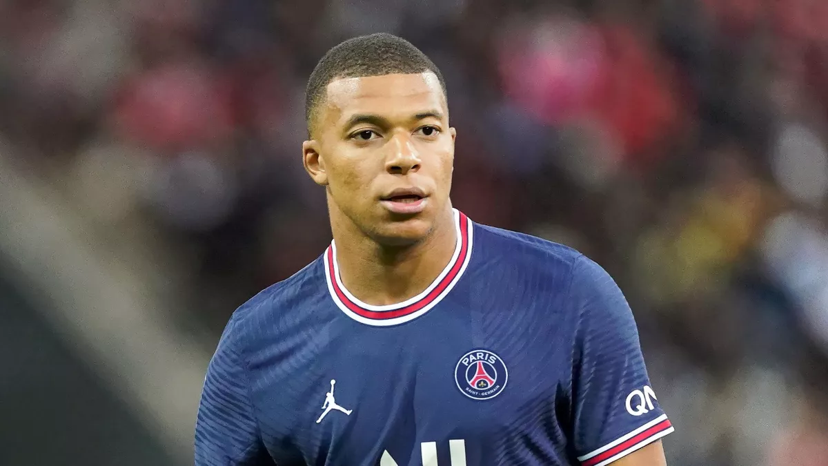 Kylian Mbappé is coming for it all: Kylian Mbappé arrives in a large SUV with tinted windows, accompanied by his mother